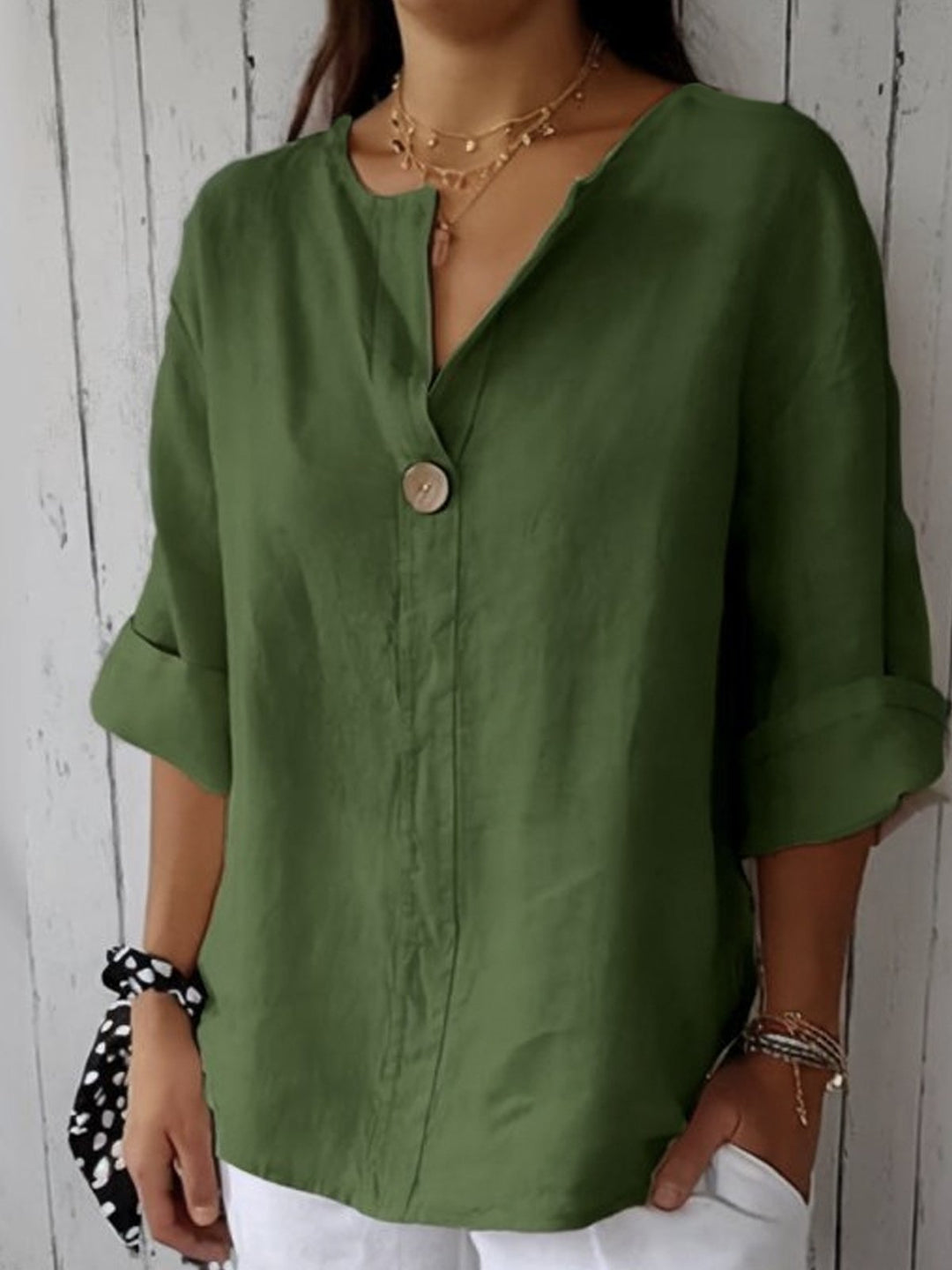 Amara™ relaxed V-neck top in green with button front and three-quarter sleeves