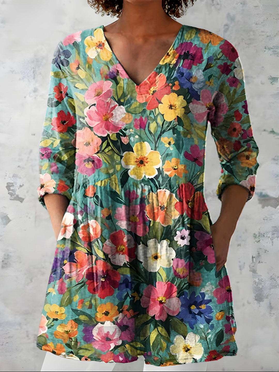 Multicolor floral V-neck blouse with gathered cuffs and tiered skirt
