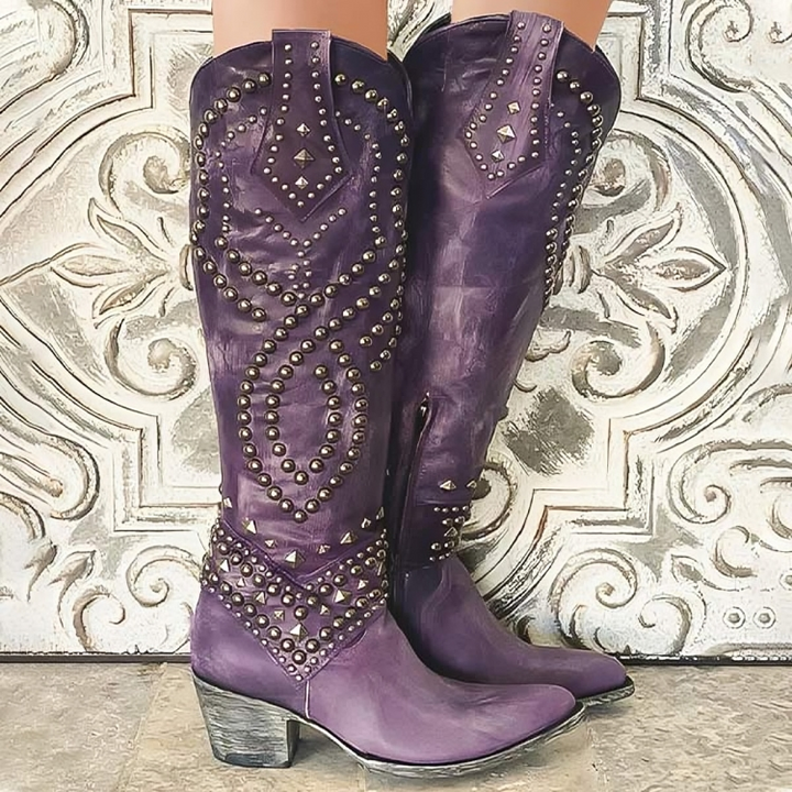 Purple western knee-high boots with silver studs and pointed toe stacked heel
