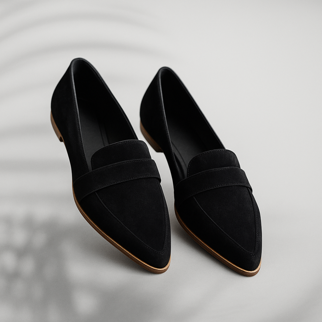 Black suede pointed slip-on loafer with double strap and low stacked sole