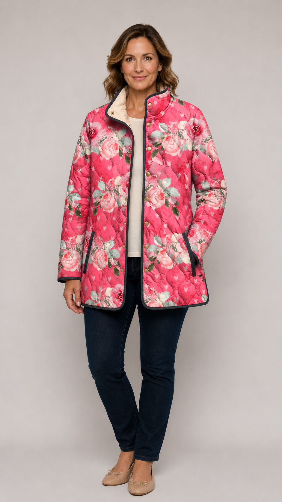 Pink quilted floral jacket with black trim, front zipper, side pockets