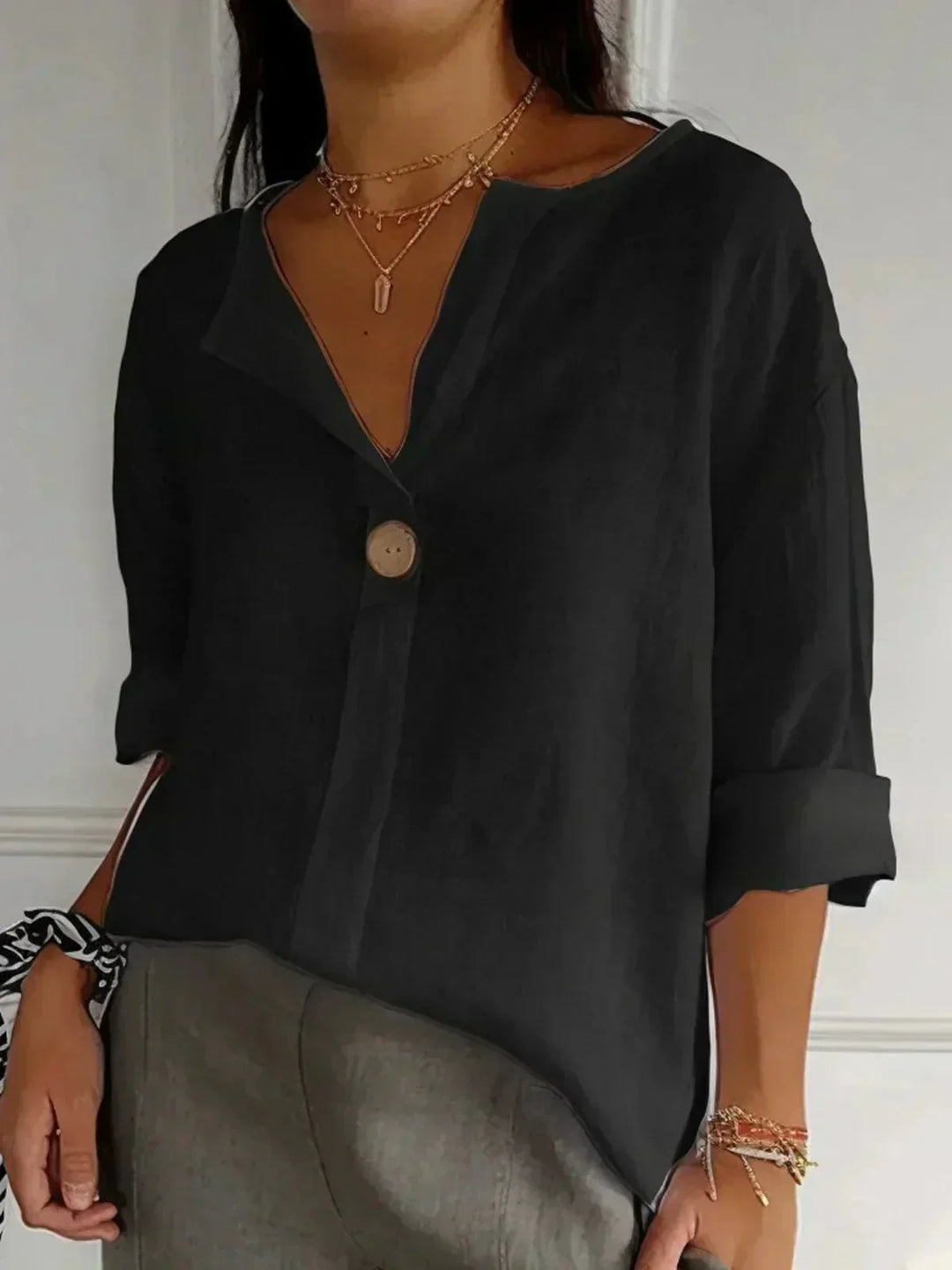 Amara™ relaxed V-neck top in black with button front and short sleeves