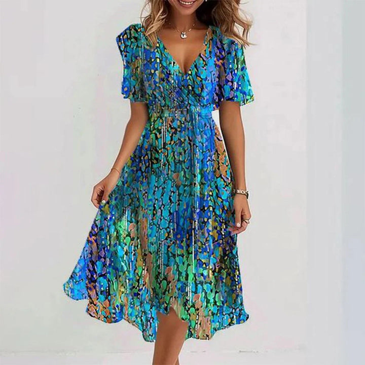 Elegant printed dress in blue multicolor with V-neck and short flutter sleeves