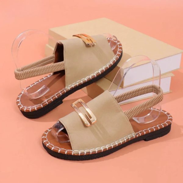 Beige comfort sandals with transparent straps and square gold buckle, open toe sole