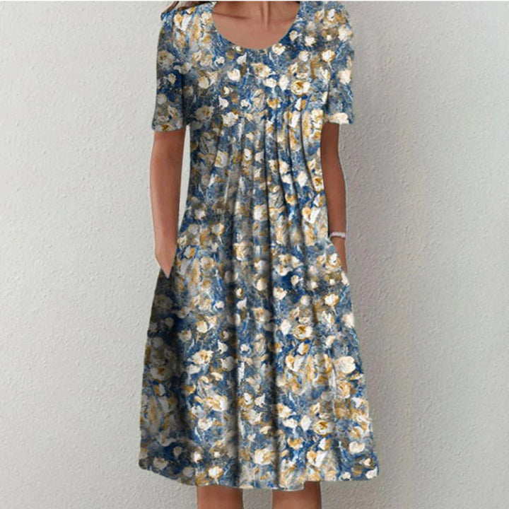 Blue and cream floral tummy control dress with short sleeves, scoop neckline, gathered skirt
