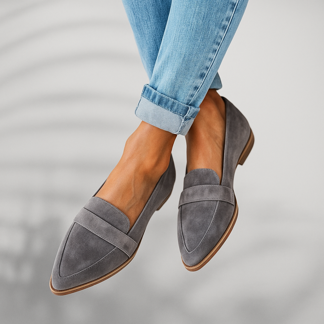 Gray suede pointed slip-on loafer with single strap and low stacked sole