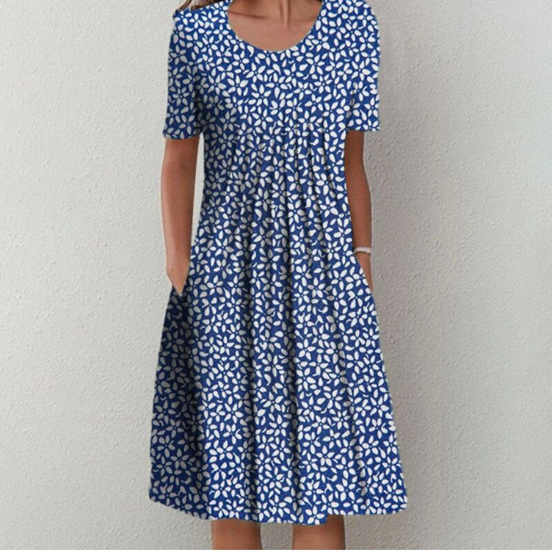 Floral blue tummy control dress with short sleeves, scoop neckline, gathered skirt