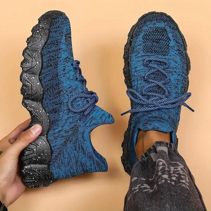Blue-black knit lace-up sneakers with chunky sole, side-by-side front views