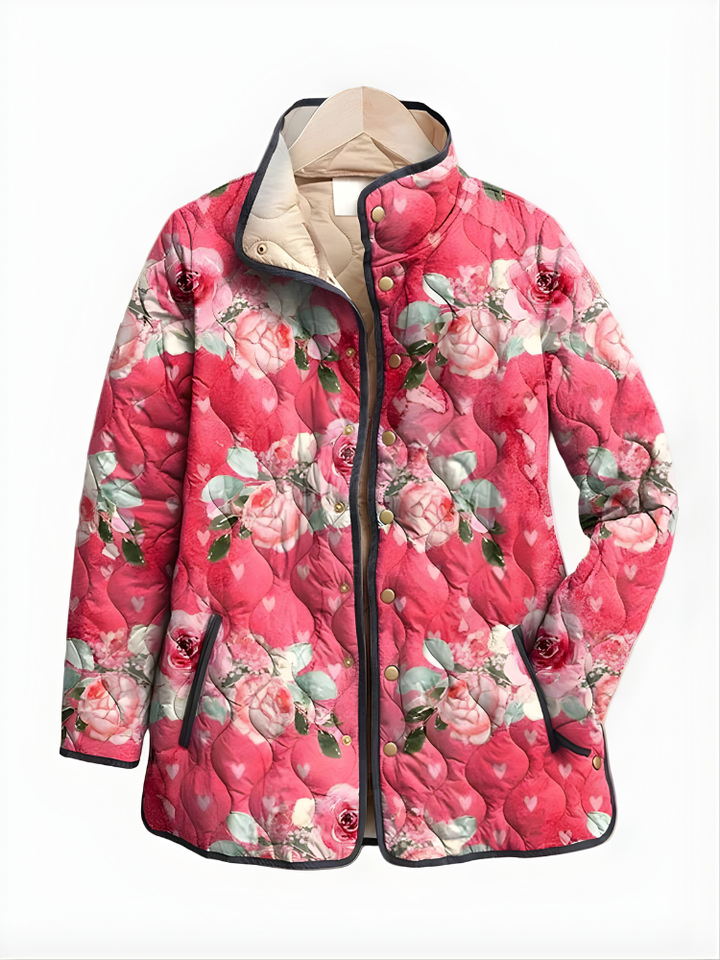 Pink floral quilted jacket with black trim, snap-button front, stand collar