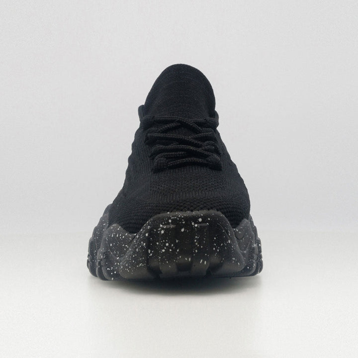 Black front view orthopedic lace-up sneaker with speckled outsole tread pattern