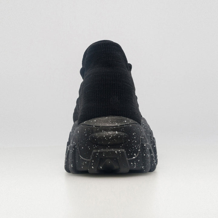 Black heel view orthopedic lace-up sneaker with speckled chunky tread sole