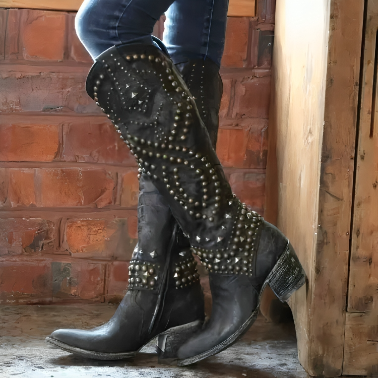 Black western knee-high boots with silver stud trim and block heel