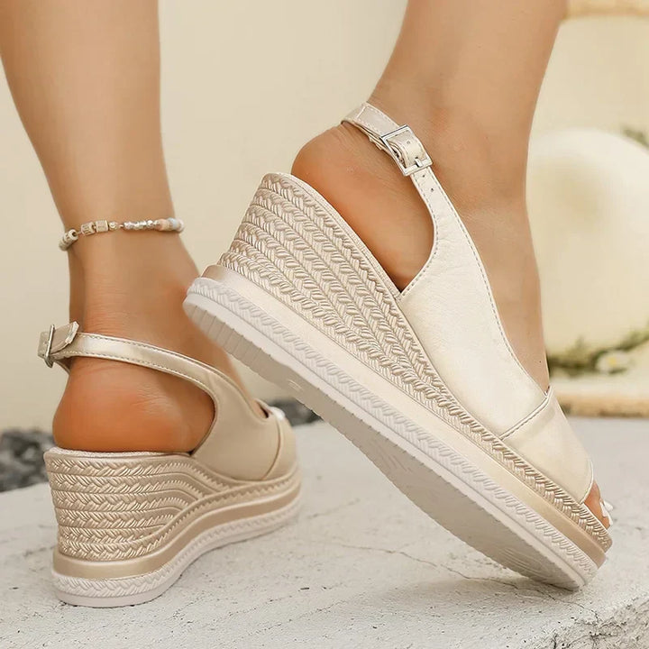 Cream orthopaedic wedge sandals with ankle strap and textured platform sole
