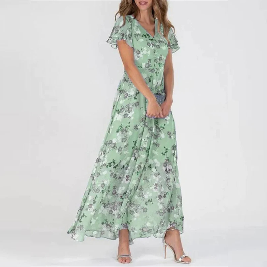 Green floral midi dress with V-neck, short flutter sleeves, and gathered skirt
