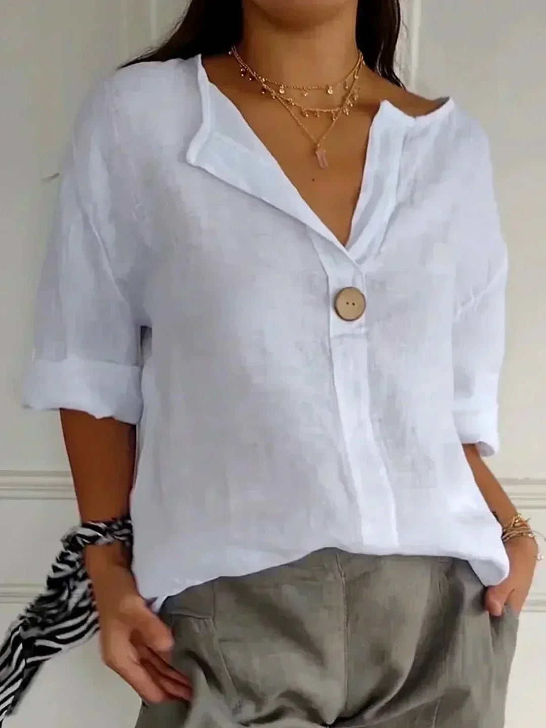 Amara™ relaxed V-neck top in white with button front and short sleeves