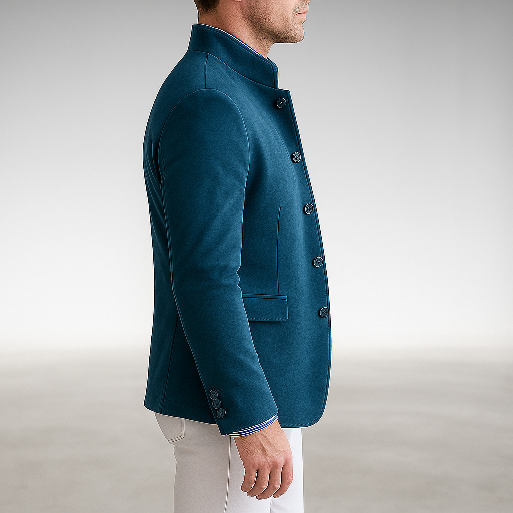 Tailored modern blazer in teal, side view with buttoned cuff and flap pocket