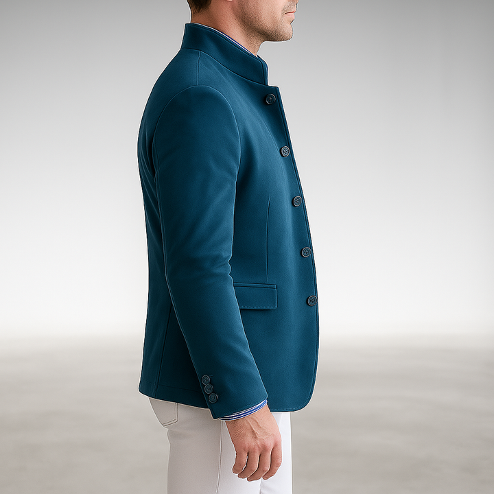 Tailored modern blazer in teal, side view with buttoned cuff and flap pocket