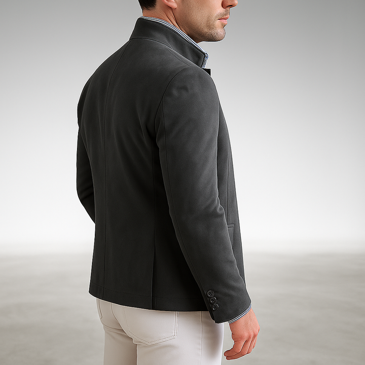 Tailored modern blazer in dark gray, side profile with button sleeve and seam detail