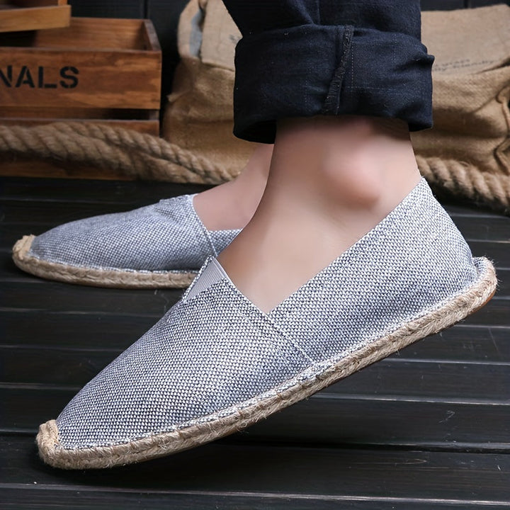 Light grey espadrille slip-on with braided jute sole and V-cut vamp