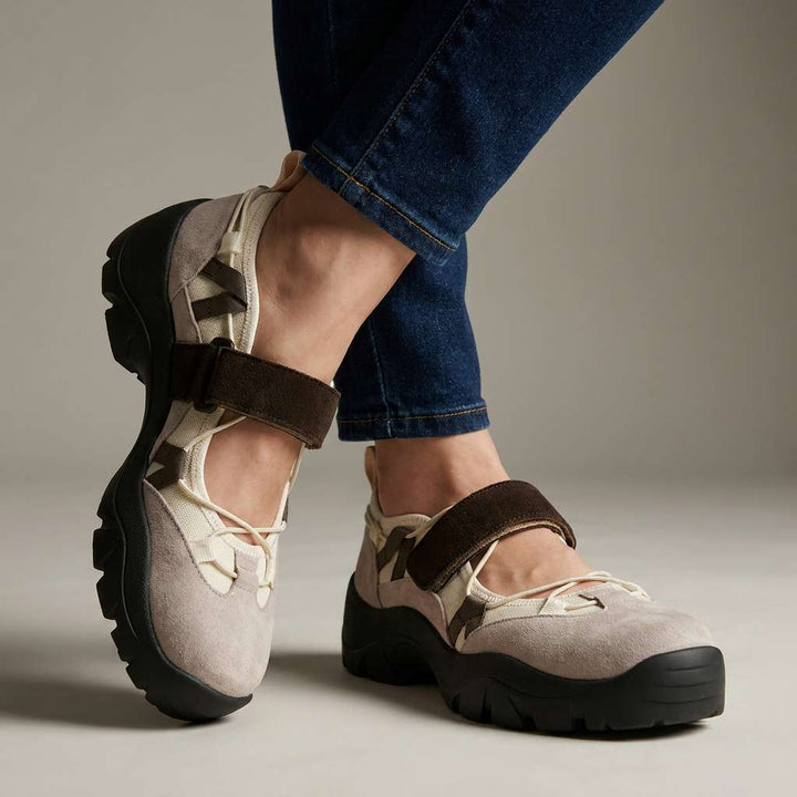 Beige suede ComfortWalk loafers with dark brown heel strap and lace-up detail